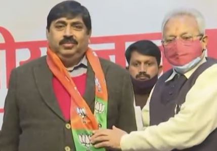 Sadhana Gupta’s bother, Promod Gupta (left) while joining the BJP government in 2022
